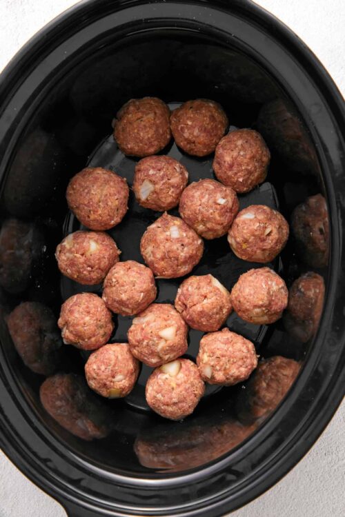 Seasoned meatballs in a slow cooker for easy cooking and delicious meal prep.