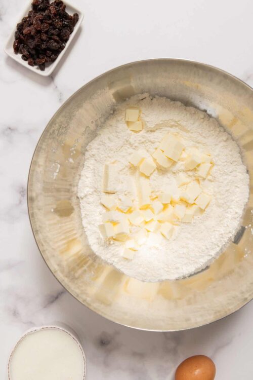 Creamy butter and flour mixture for baking or pastry making on a marble surface.
