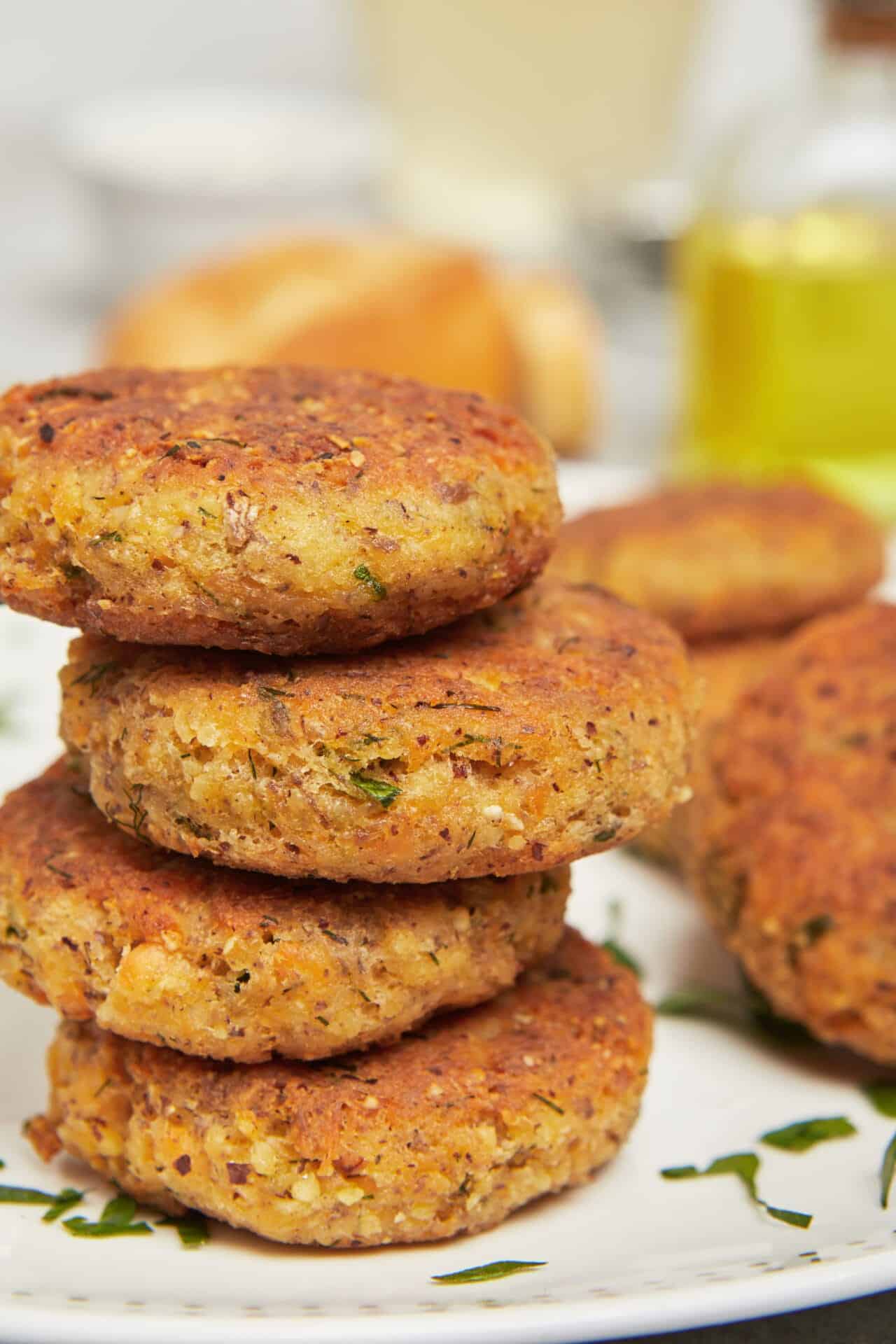 Crispy homemade crab cakes with herbs, served with lemon wedges. Perfect seafood appetizer or main dish.