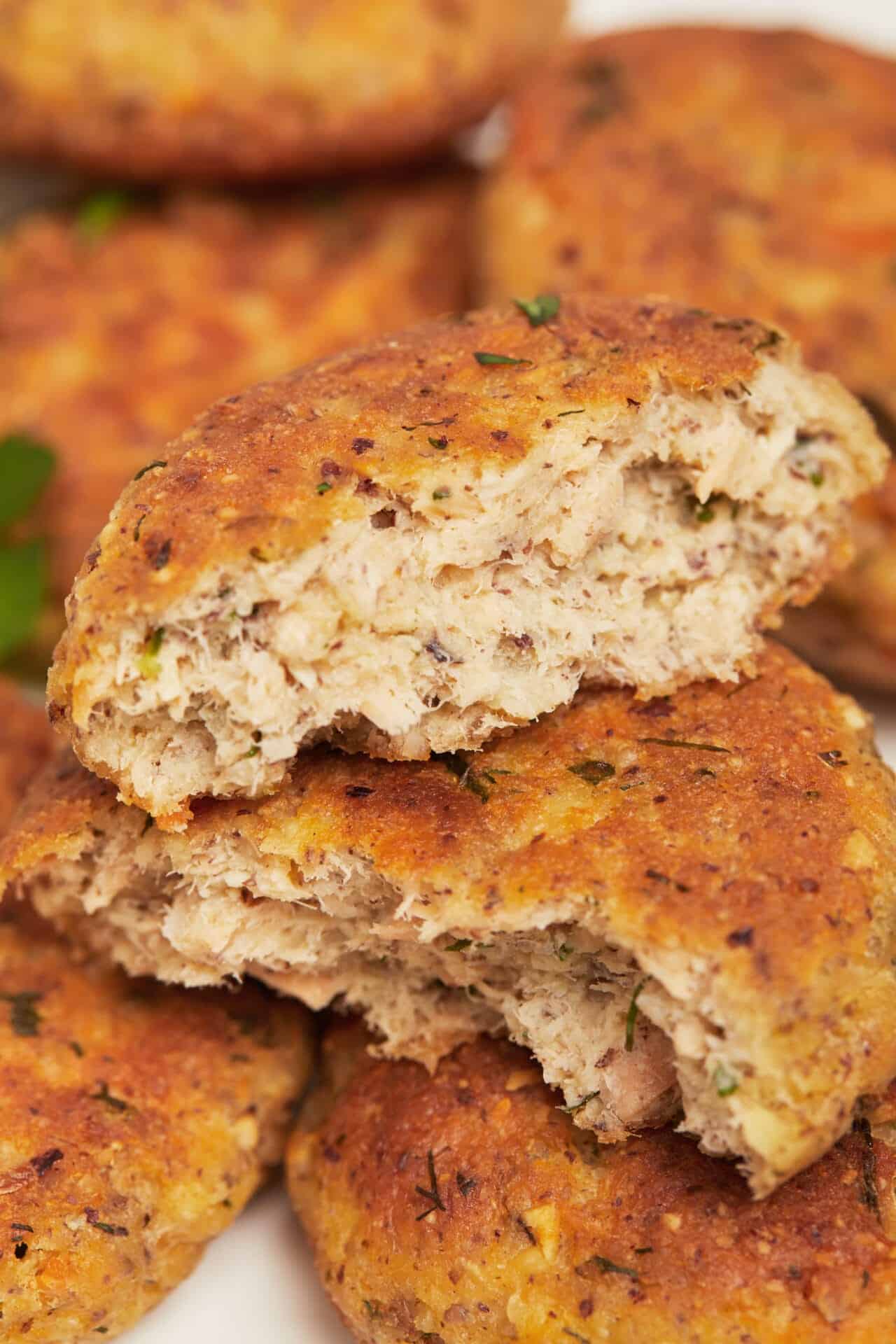 Crispy homemade chicken patties with herbs and spices.