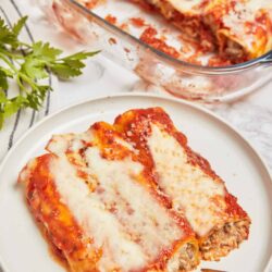 Classic homemade lasagna with melted cheese and rich tomato sauce. Perfect comfort food for family dinners and special occasions.