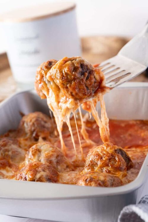 Savory meatball casserole with melted cheese and rich tomato sauce.