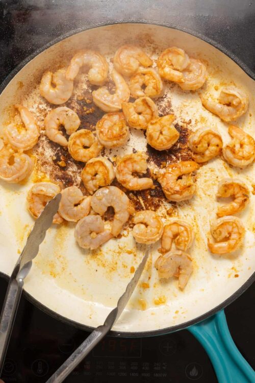 Succulent sautéed shrimp in a creamy garlic sauce, perfect for seafood dishes and dinner recipes.