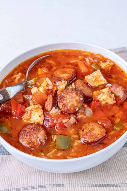 Hearty sausage and vegetable stew with tomatoes and flavorful seasonings. Perfect comfort food for chilly days.