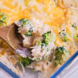Creamy broccoli cheese baked casserole with melted cheese and fresh broccoli florets.