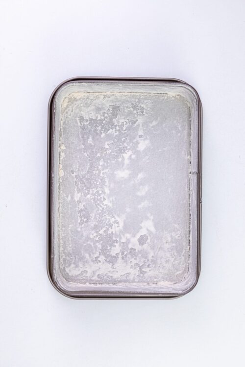 Scratched and used baking sheet for homemade baked goods.