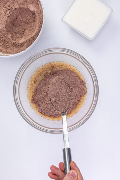 Fineness of cocoa powder in a mixing bowl for baking.