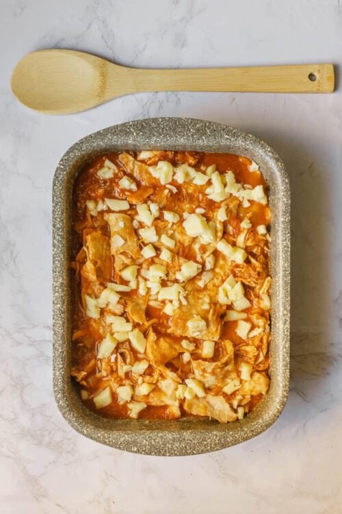 Baked chicken and cheese casserole in a baking dish, ready to serve.