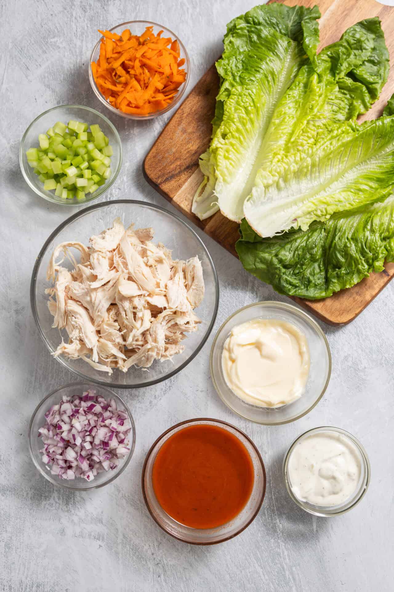 Fresh chopped vegetables and cooked chicken for healthy salads or wraps at Baked Bree.