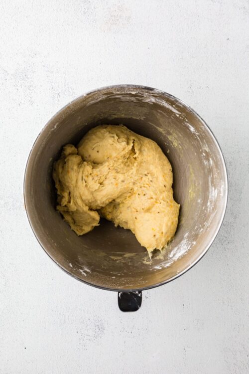 Buttery homemade biscuit dough in a mixing bowl ready for baking.