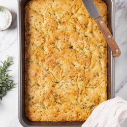 Creamy garlic herb chicken casserole baked in a KitchenAid pan for easy serving. Perfect comfort food recipe.