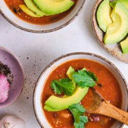 Creamy vegetarian chili with avocado and fresh cilantro.