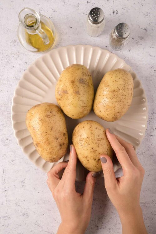 Comfortable baked potatoes ready for seasoning and cooking.