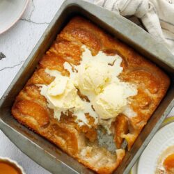 Butter baked peach cobbler with vanilla ice cream.