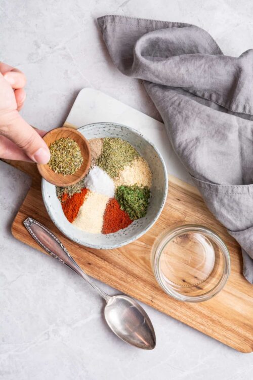 Dried herbs and spices in a bowl for baking or seasoning.