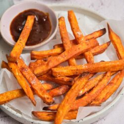 Crispy sweet potato fries with spicy dipping sauce.