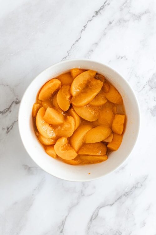 Sweet peaches and apricots in a syrup, perfect for baking or snacking.