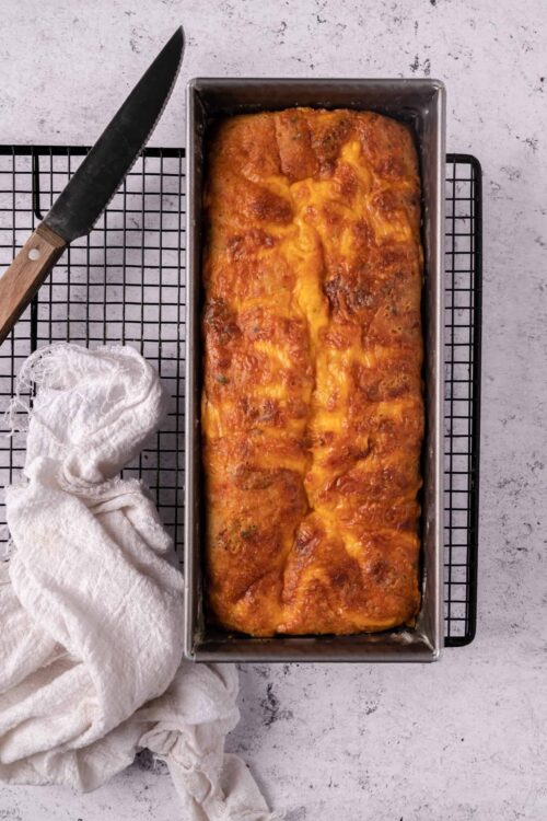 Baked cheese lasagna in a baking pan.