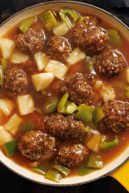 Juicy Meatballs with Vegetables Cooking in Tomato Sauce, Comfort Food Recipe from Baked Bree.