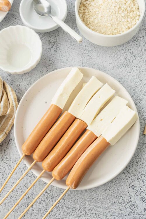 Cream cheese and hot dogs on skewers for easy appetizer or snack. Perfect for parties and casual gatherings.