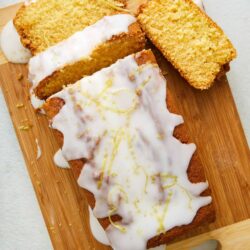 Light Lemon Pound Cake with Lemon Glaze on Wooden Cutting Board, Baked Bree.