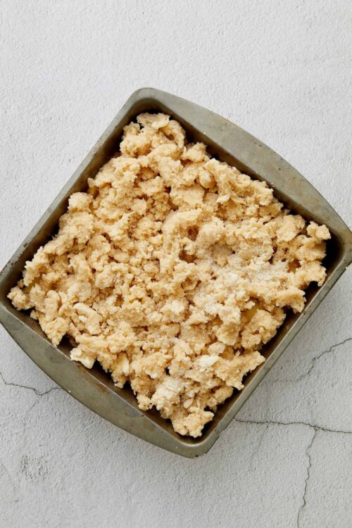 Butterscotch crumble topping in a gray baking dish. Perfect for pies and dessert recipes.
