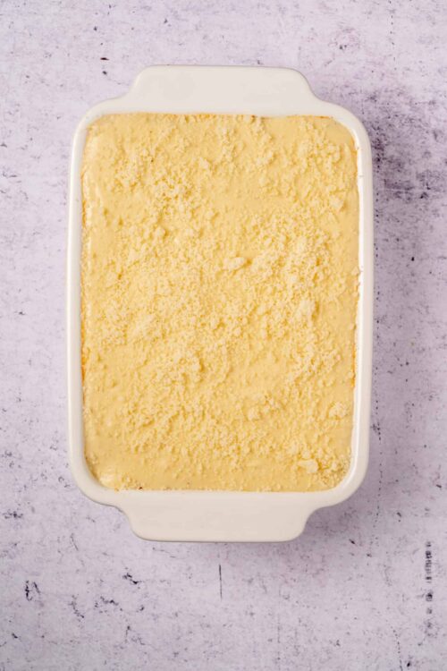 Butter brickle ice cream in a white baking dish, top view.