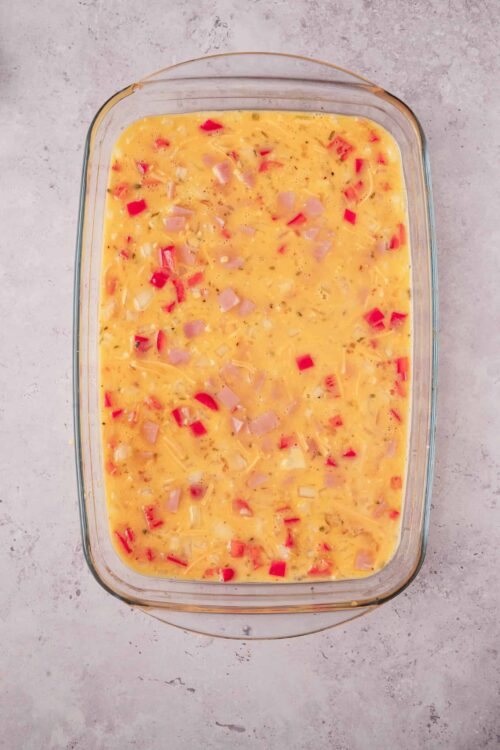 Baked Broccoli and Cheddar Egg Casserole in a glass dish.