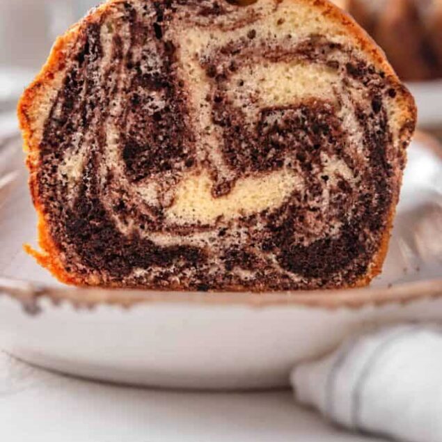 Marble bundt cake with chocolate and vanilla swirls, homemade baked dessert, perfect for brunch or special occasions.