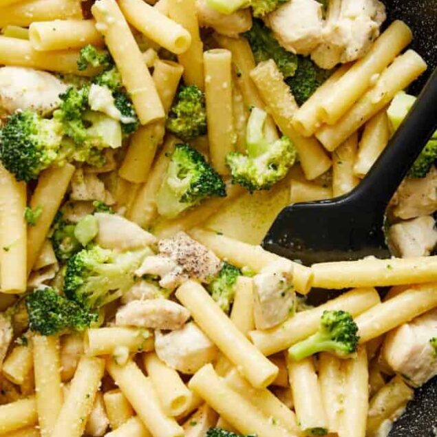 Creamy chicken broccoli pasta in a skillet, perfect for easy weeknight dinners. Delicious and comforting baked pasta recipe.