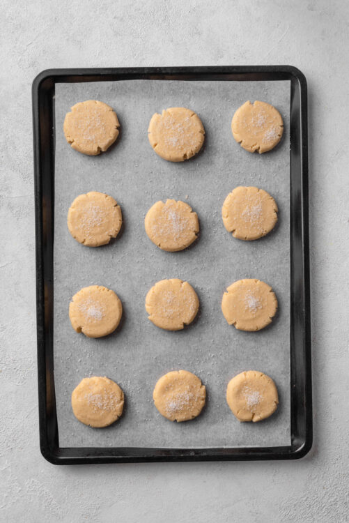 Butter cookies on baking sheet with salt flakes, homemade dessert, baked goods, cookie recipe, baked bree.