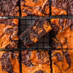Rich chocolate marble brownies cut into squares on a cooling rack. Perfect homemade brownie recipe with marbled chocolate and vanilla flavors.