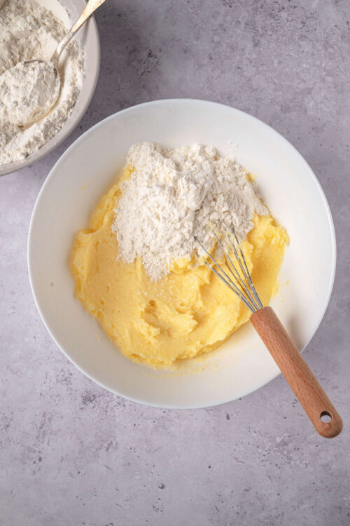 Creamy mashed potatoes with flour for baking, mixing ingredients for potato bread.