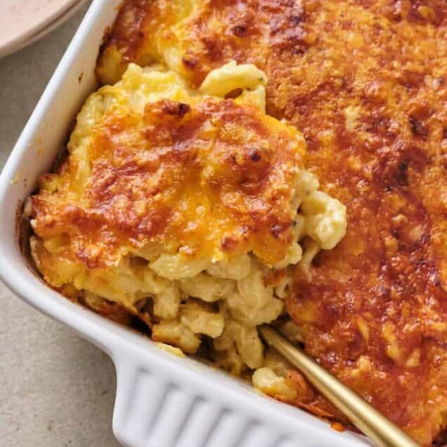 Creamy baked macaroni and cheese casserole with a golden crust, perfect comfort food.