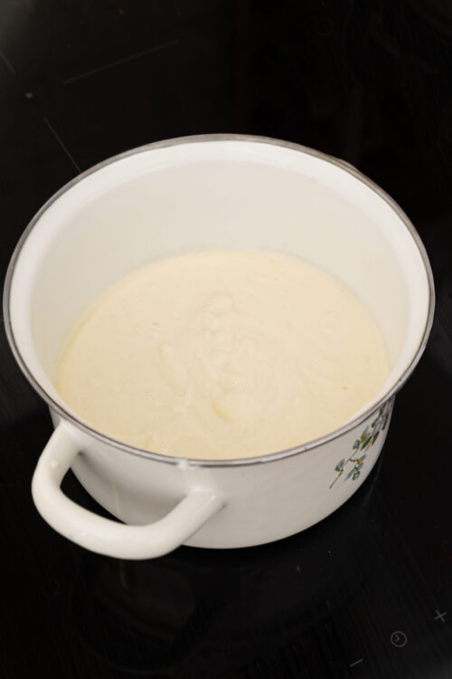 Flour and butter mixture in a white mixing bowl for baking recipes.