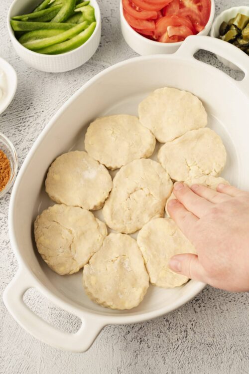 Soft homemade biscuit dough in baking dish ready to bake, from Baked Bree kitchen.