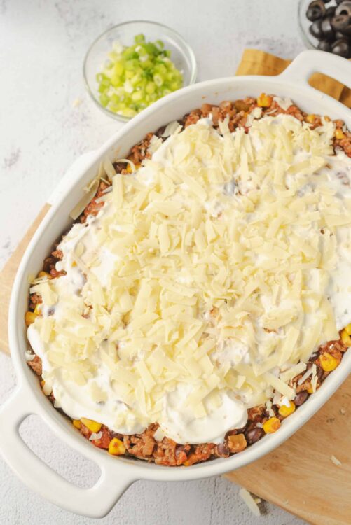 Creamy baked enchiladas with melted cheese and flavorful filling. Perfect for family dinners and comfort food lovers.