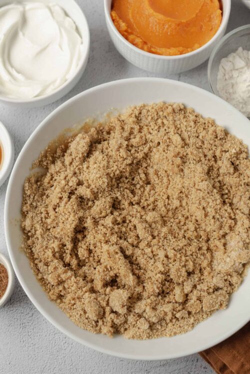 Golden brown crumb topping in a white bowl.
