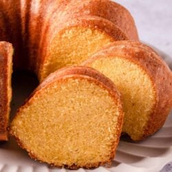 Buttermilk vanilla pound cake slices on a white plate.