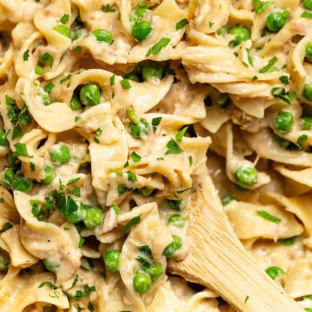 Creamy chicken and peas pasta casserole with herbs and a rich sauce. Perfect comfort food recipe for family dinner.