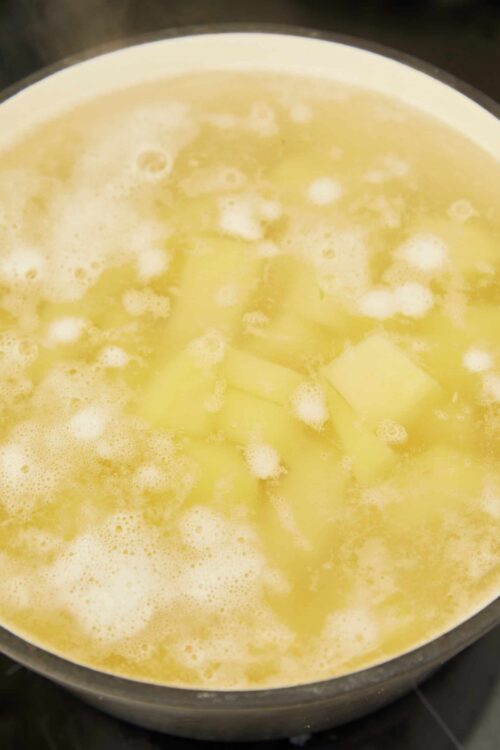 Creamed butter and garlic cooking in a skillet, ready to make flavorful sauces or dishes.