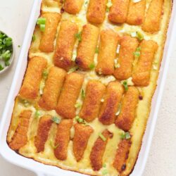 Golden baked casserole with breaded chicken tenders and creamy sauce.