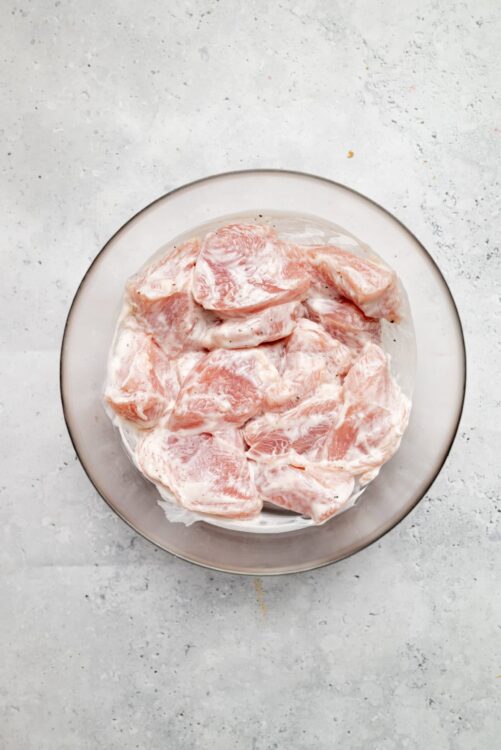 Marinated chicken thighs in creamy herb sauce perfect for baked chicken recipes.