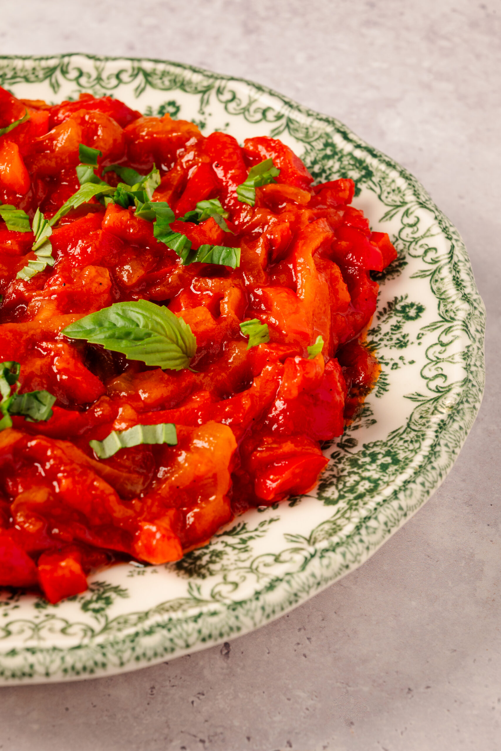 Peperonata in a plate shot from diagonal