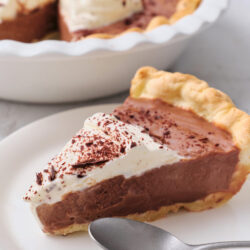 Chocolate cream pie slice shot from diagonal