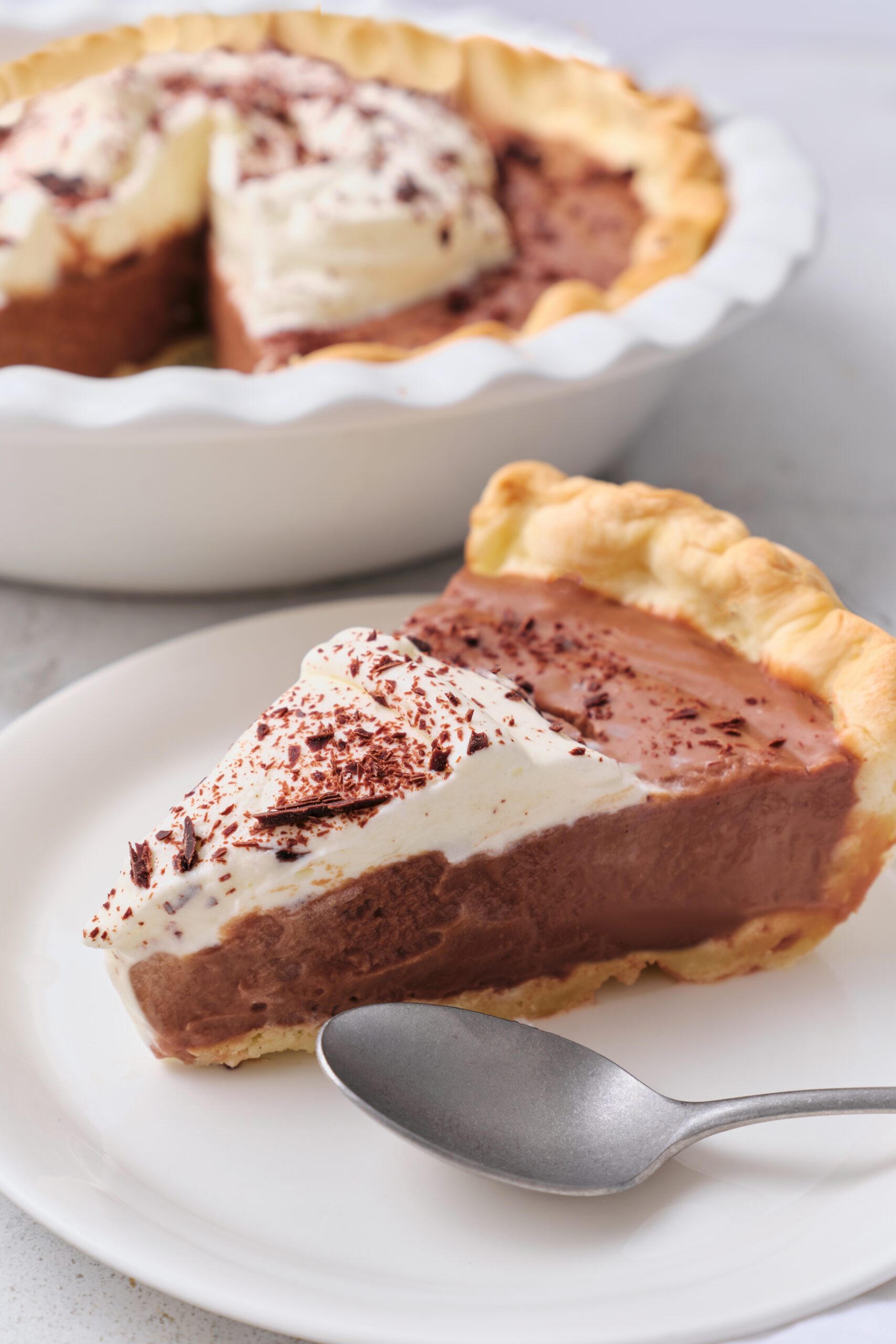 Chocolate cream pie slice diagonal shot