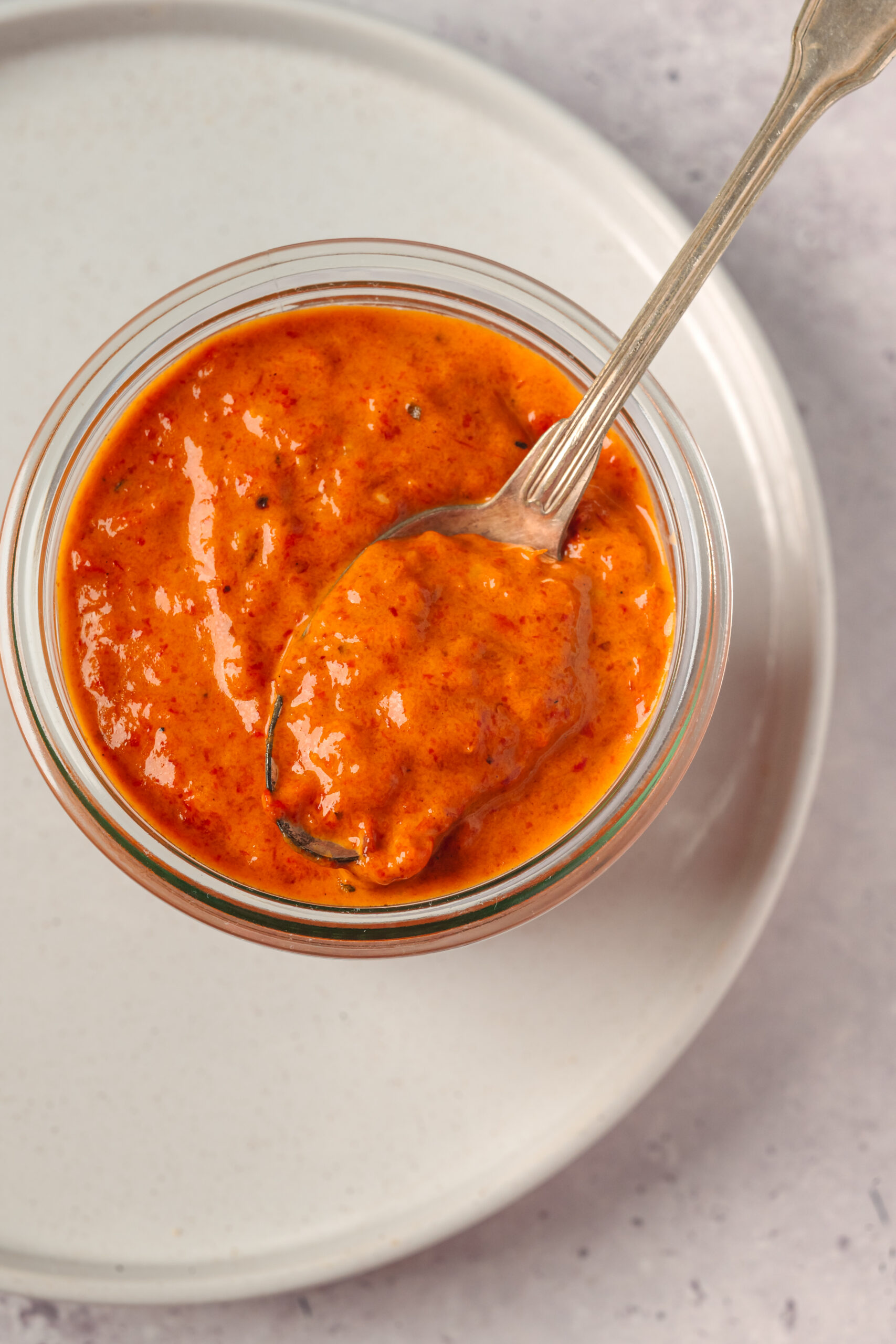 Roasted Red Pepper Sauce in a container shot from above