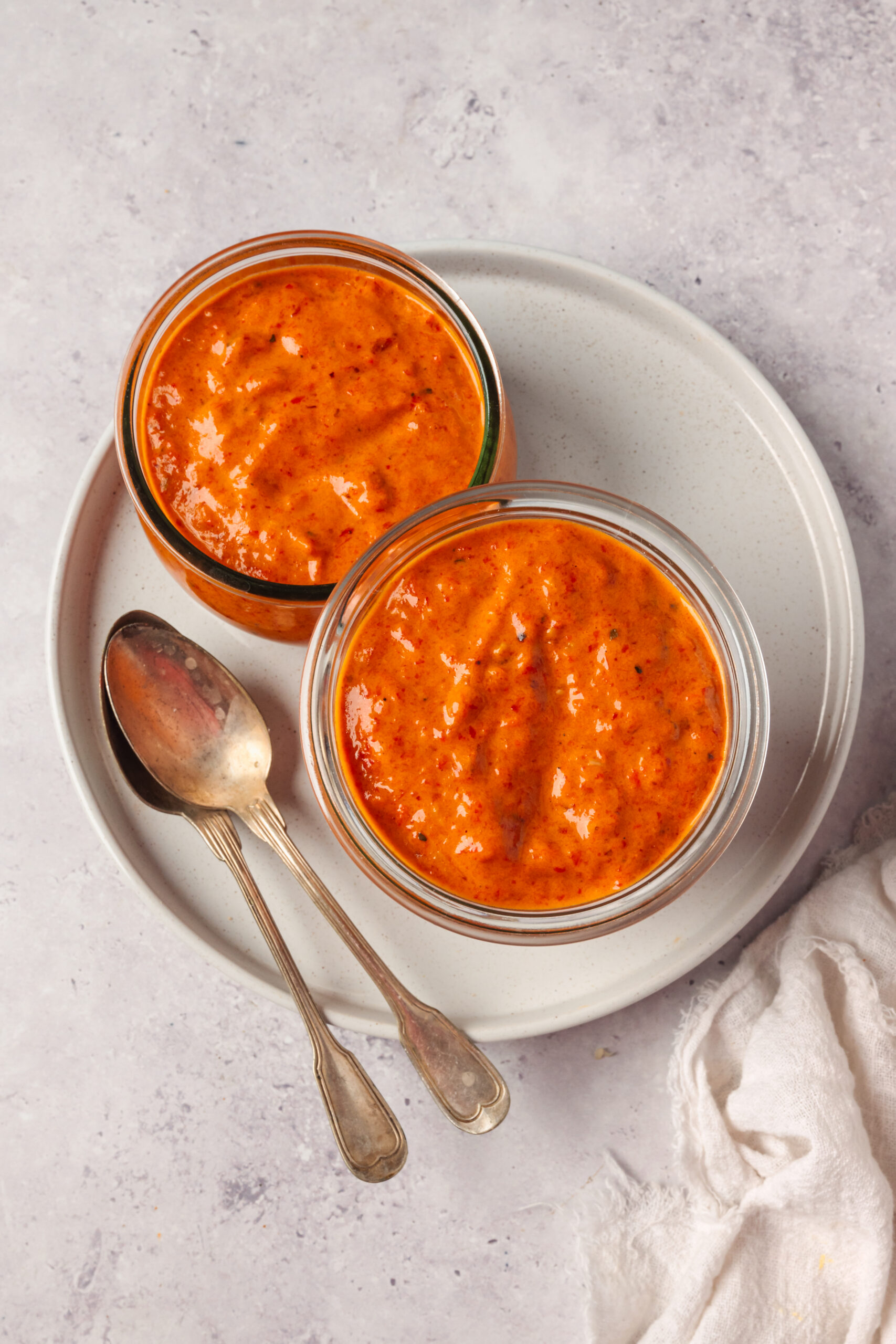 Roasted Red Pepper Sauce in a container shot from above