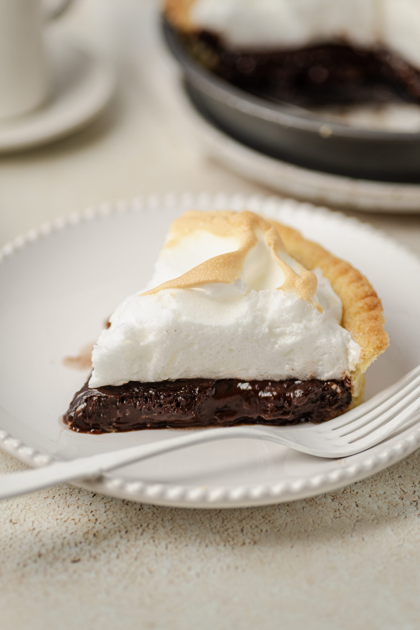 Chocolate Pie slice on a plate close-up shot