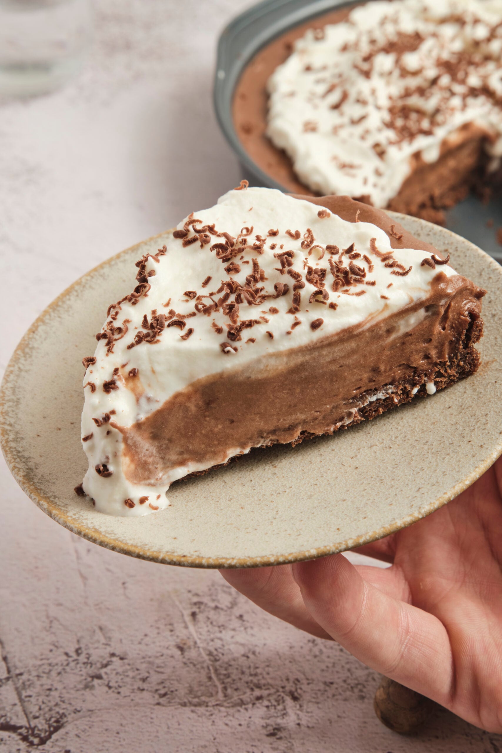 French Silk Pie slice on a plate shot from the side